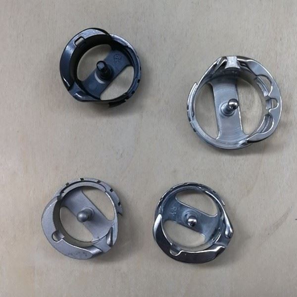Rotary hook metal injection molded parts_
